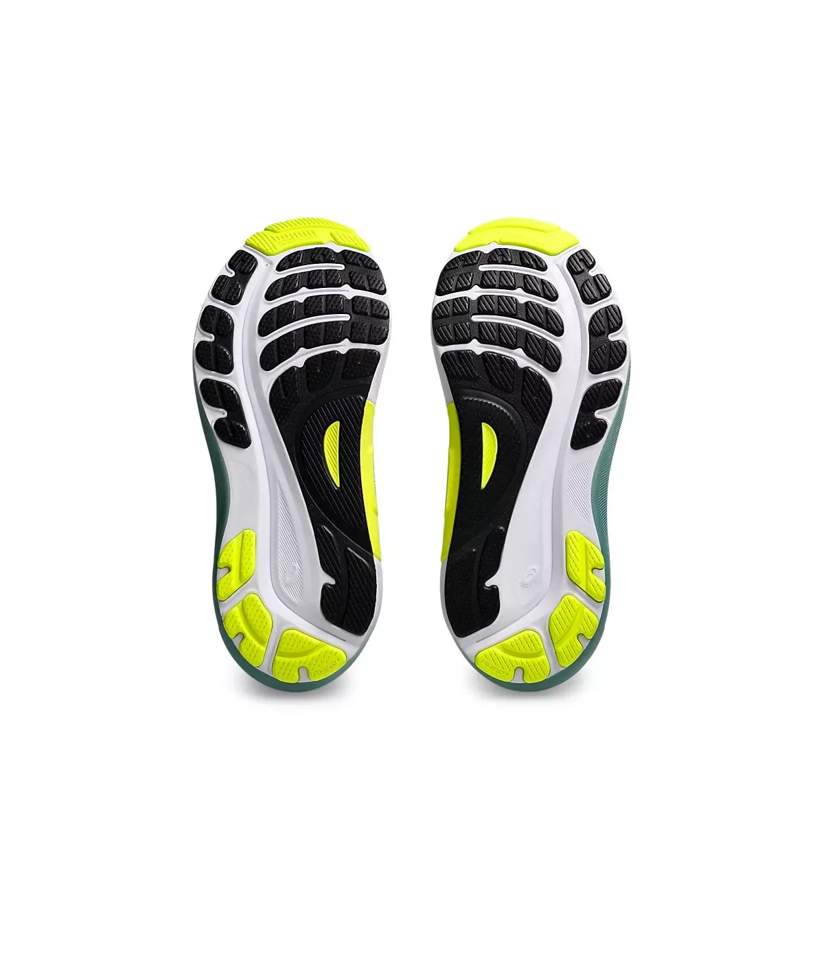 Semelles de chaussures de sport jaunes et vertes.