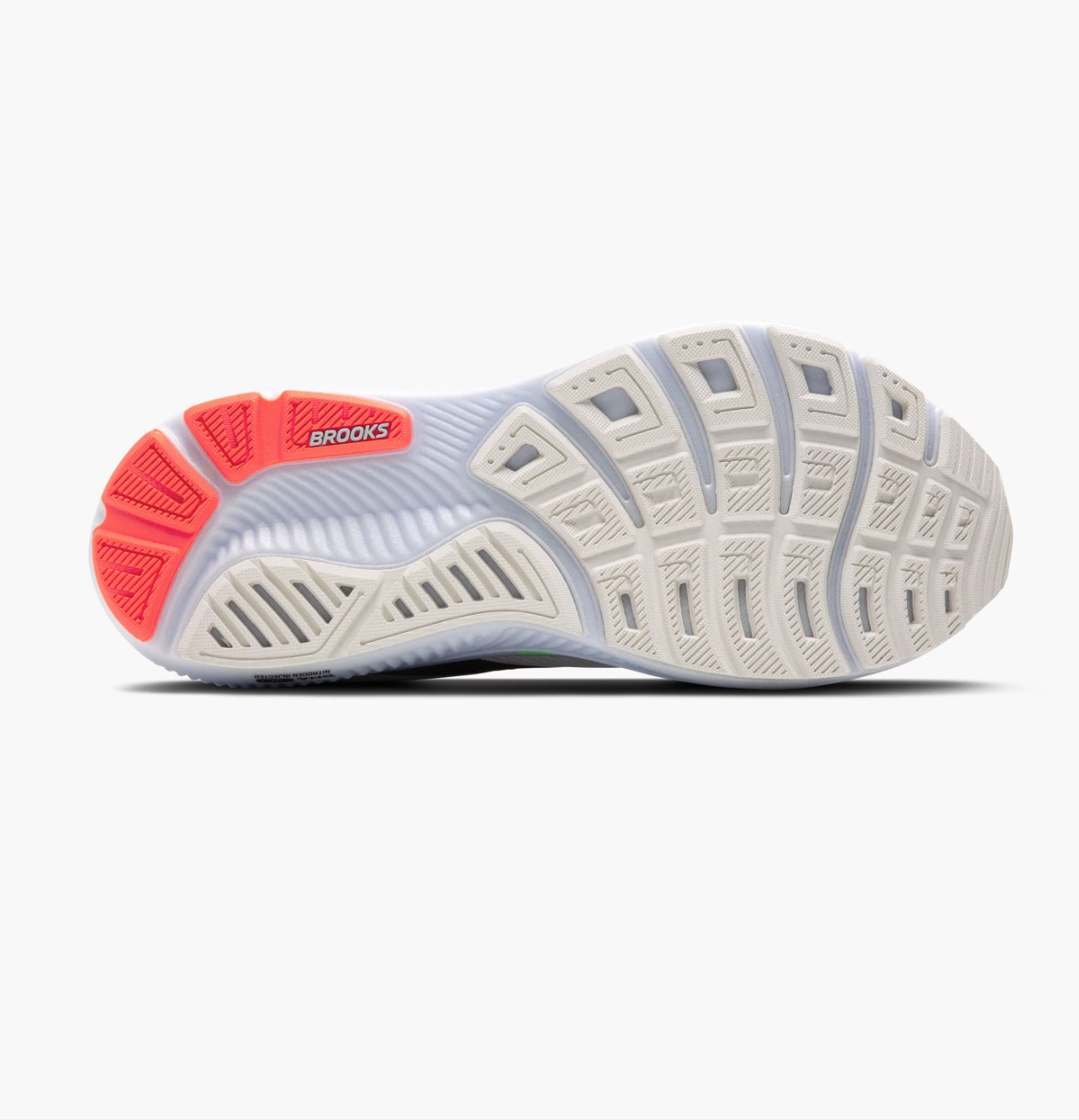 Semelle de chaussure de sport Brooks, blanche et rouge.