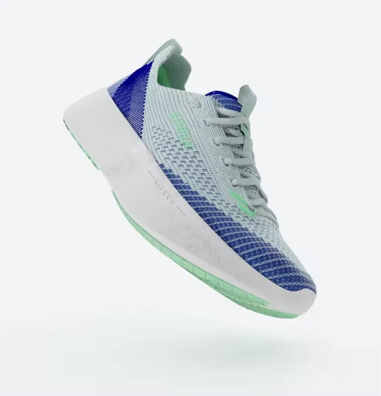 Chaussure de sport bleu et vert flottant.