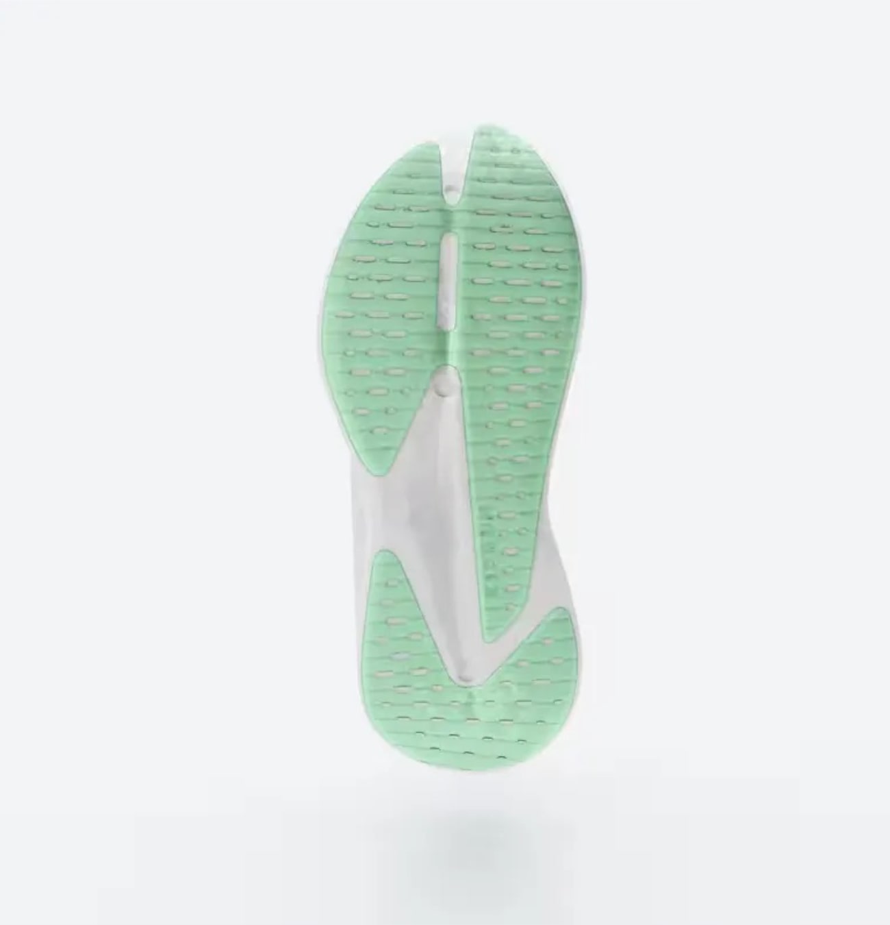 Semelle blanche et verte de chaussure de sport