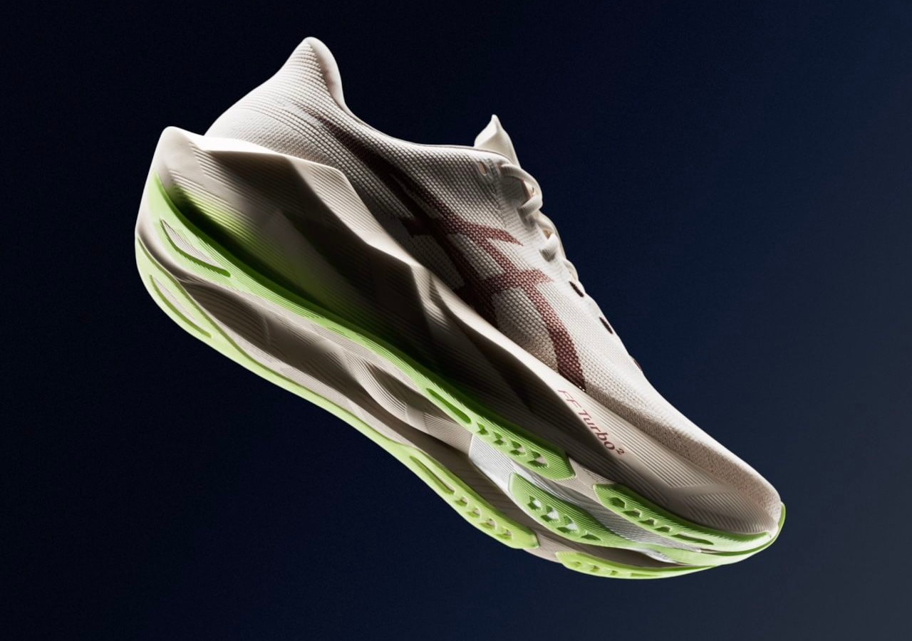 Chaussure de running blanche semelle verte flottante