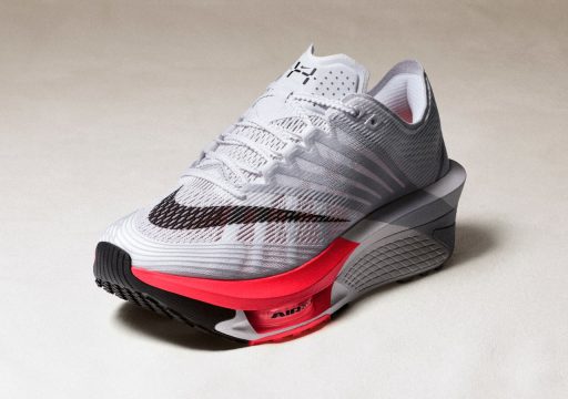 Chaussure de running Nike blanche et rose