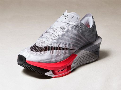 Chaussure de running Nike blanche et rose